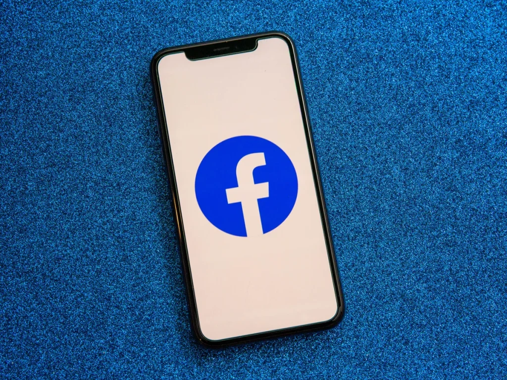 001 facebook app logo on phone 2021